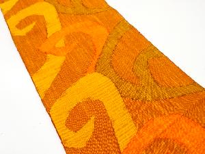 手織り真綿紬　抽象唐草模様織り出し名古屋帯